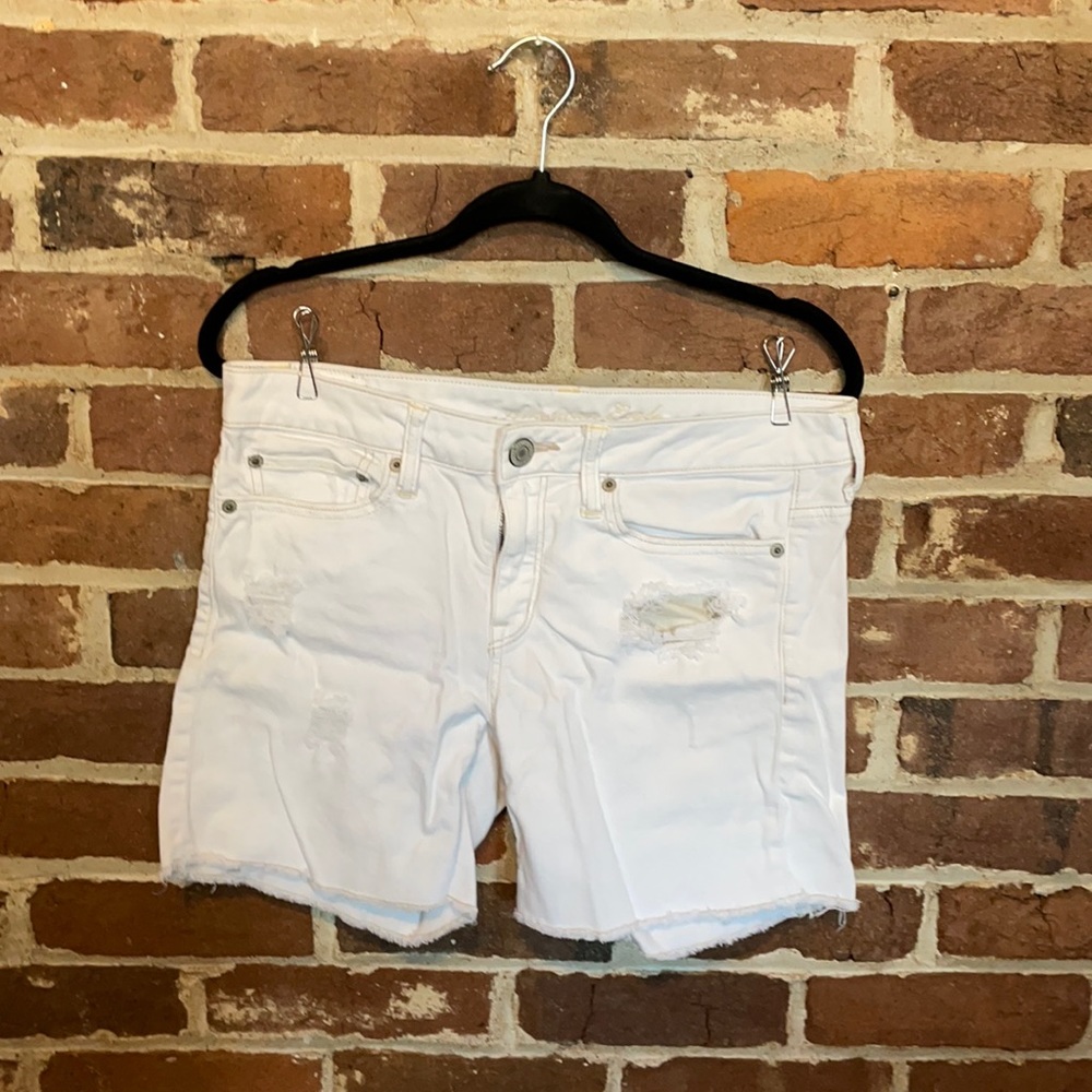American Eagle, size 6, stretch white jean shorts, distressed look